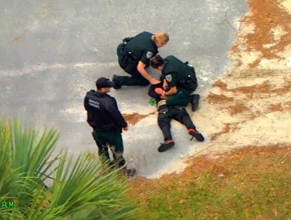 A Florida man with a warrant tried to outrun Air One Helicopter for about 30 minutes Friday afternoon but ultimately decided to surrender to deputies on the ground.