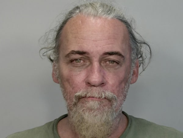 A 54-year-old Florida man was arrested Wednesday for bashing a woman’s head into a car window.