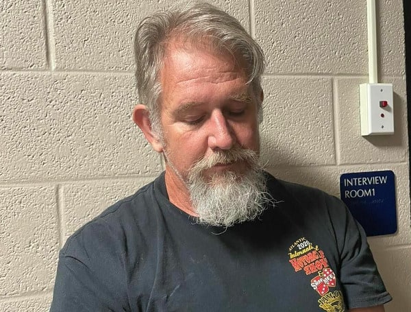 A 55-year-old Florida man is behind bars, and an innocent female hotel employee is on life support after a cruel act of violence was unleashed Saturday in Kentucky.
