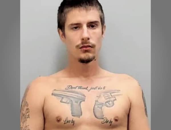 A Florida man with the guns inked at the top of his chest that says "Don't Think Just Do It" is behind bars on drug trafficking charges.
