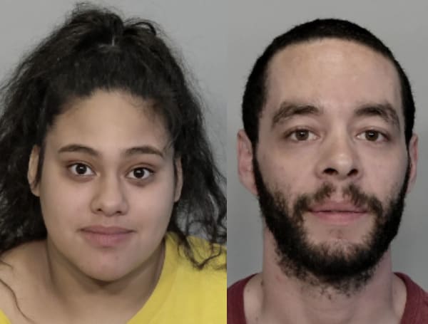 A Florida couple was arrested Monday following a romantic "interlude" with a third person that turned violent, according to deputies.