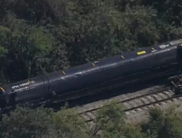A Seminole Gulf Railway train carrying propane derailed near a Florida airport on Tuesday, prompting a major clean-up, officials said.