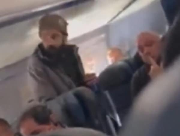 Cellphone video captured the moment when a passenger on a United Airlines flight threatened to "kill every man on this plane" before attacking a flight attendant with a broken metal spoon.