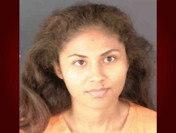 Anabel Ossombi, 27, of Bradenton, has been arrested and is facing several felony charges, including criminal use of personal identification of over 30 victims, scheme to defraud over $50,000, and money laundering. 