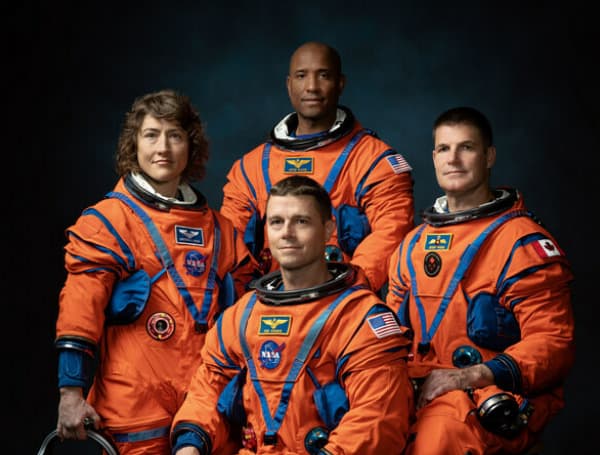 The crew of NASA’s Artemis II mission (left to right): NASA astronauts Christina Hammock Koch, Reid Wiseman (seated), Victor Glover, and Canadian Space Agency astronaut Jeremy Hansen.