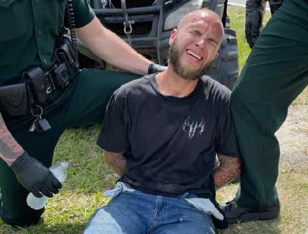 A Florida man is heading to jail on Tuesday after running from deputies on a 4-wheeler for beating a young child.