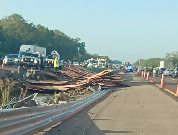 PASCO COUNTY, Fla. - A semi-truck with a load of plywood lost its load on I-75 early Thursday in Pasco County, causing a shutdown and delays.