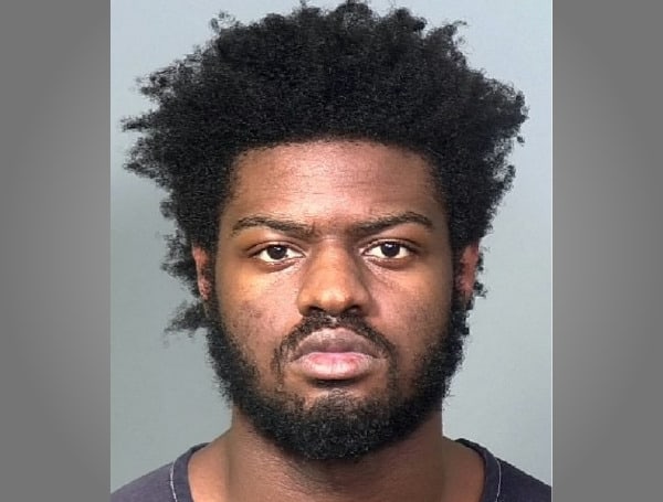 MANATEE COUNTY, Fla. - A 19-year-old man who had an outstanding warrant for second-degree murder and robbery in connection with a shooting on 10th Avenue W., turned himself into the Bradenton Police Department on Friday, June 23. 