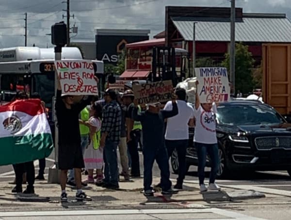 Protests are taking place across Florida cities while some businesses shut their doors Thursday in opposition to a new immigration law signed by Florida Gov. Ron DeSantis.