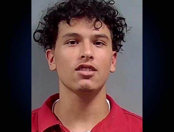 A Florida man was arrested on Sunday, July 23, after he struck another man with a machete at a bar, according to police.