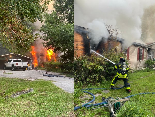 TAMPA, Fla - Hillsborough County Fire Rescue fought a fire at a manufactured home on Wednesday morning after a neighbor heard a loud 'boom.'