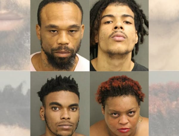 Four people have been arrested and charged with kidnapping in Florida after a woman claimed that they held her against her will in a dog cage.