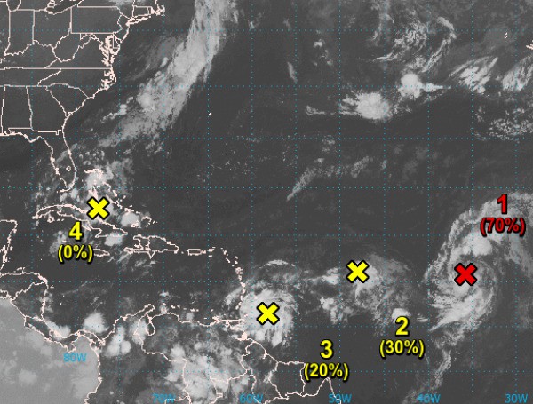 National Hurricane forecasters said Saturday morning that a tropical wave nearing the Gulf of Mexico could form into a tropical depression within a week.