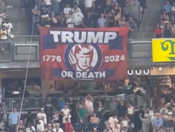 A pair of pro-Trumpers at Yankee Stadium made it clear that Founding Father Patrick Henry’s claim that liberty trumps all, even death, definitely applies to their guy.