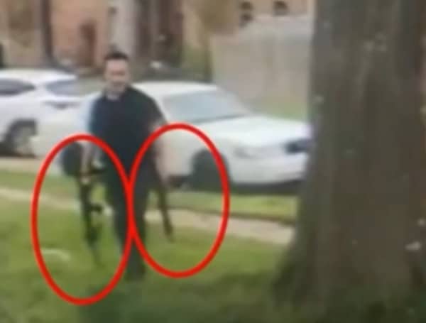 Suspect Holding Two Rifles Advances On Cops And Then Gets Shot On Video