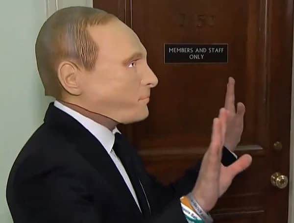 Democratic Florida Rep. Jared Moskowitz wearing Russian President Vladimir Putin mask. (CSPAN)