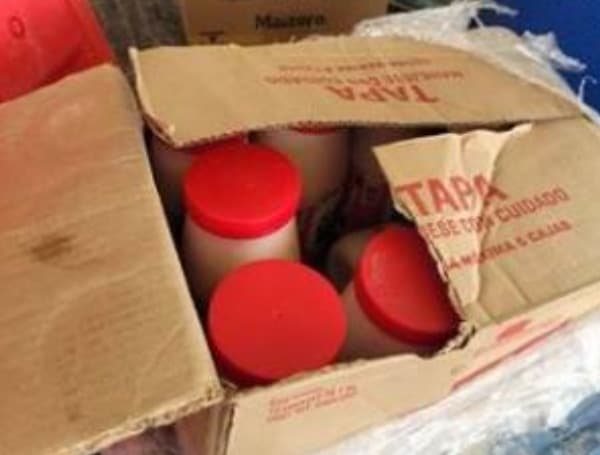 Jars of lard in carboard box. CBP officers seized loads of 32.40 pounds, 31.39 pounds and 30.99 pounds of methamphetamine within jars of lard at Eagle Pass Port of Entry (CBP)