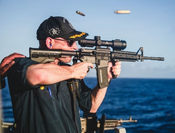 Cmdr. Cameron Yaste, the Commanding Officer of the Arleigh Burke-class guided-missile destroyer USS John S. McCain (DDG 56), fires at the "killer tomato" during a gun shoot. Photo by Petty Officer 3rd Class Kevin Tang